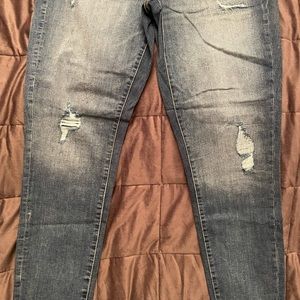 Women’s high rise skinny distressed jeans